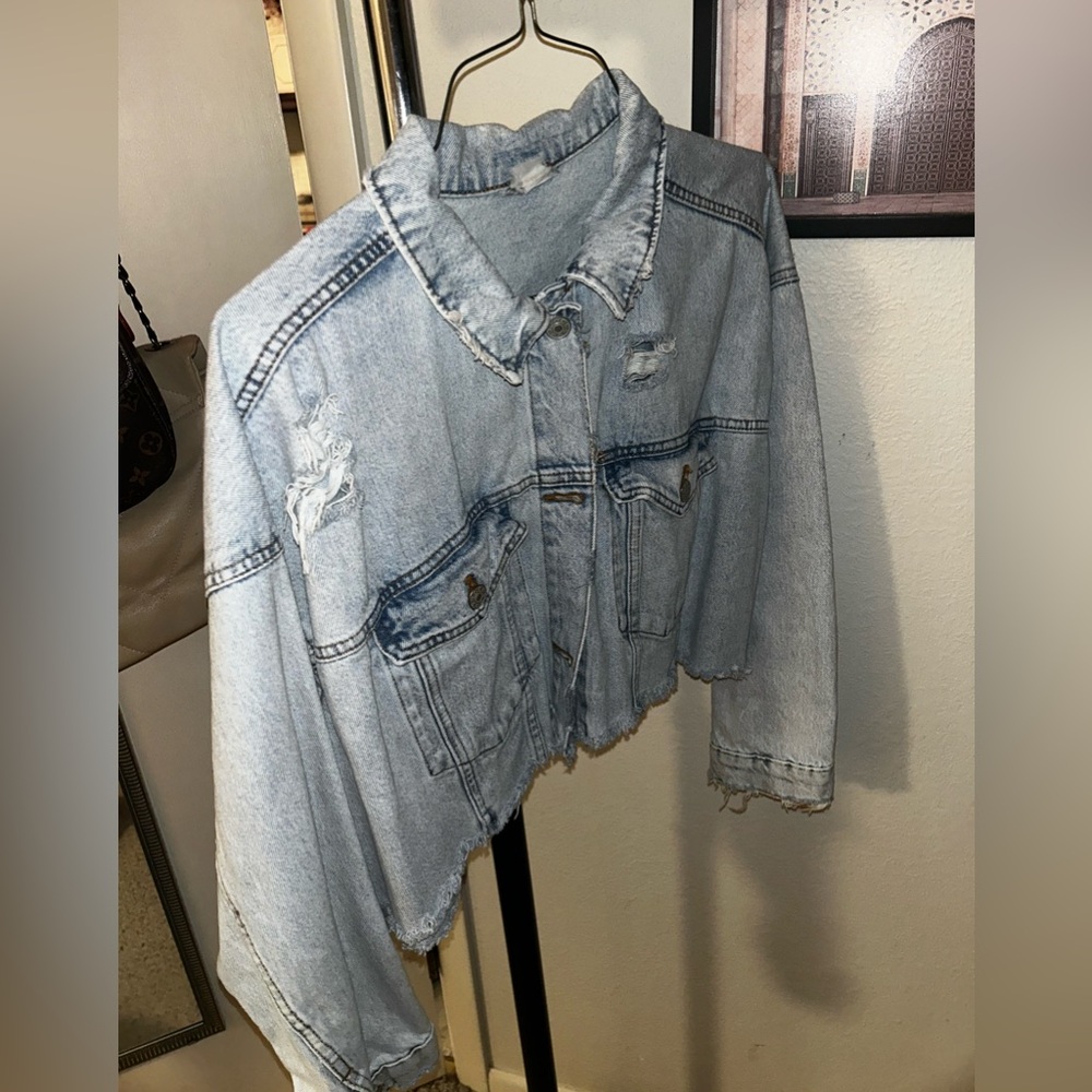 Distressed cropped denim jacket
